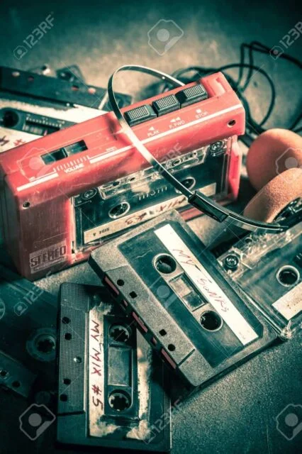 106610865 vintage cassette tape with headphones and walkman