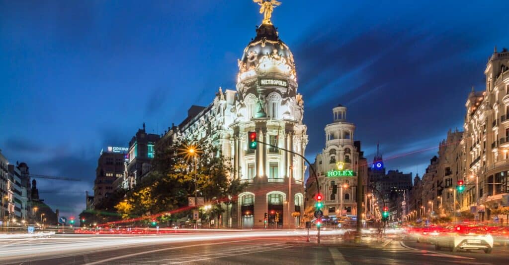 pexels-photo-165637-165637 A stunning night view of the Metropolis Building with light trails and vibrant city lights in Madrid.